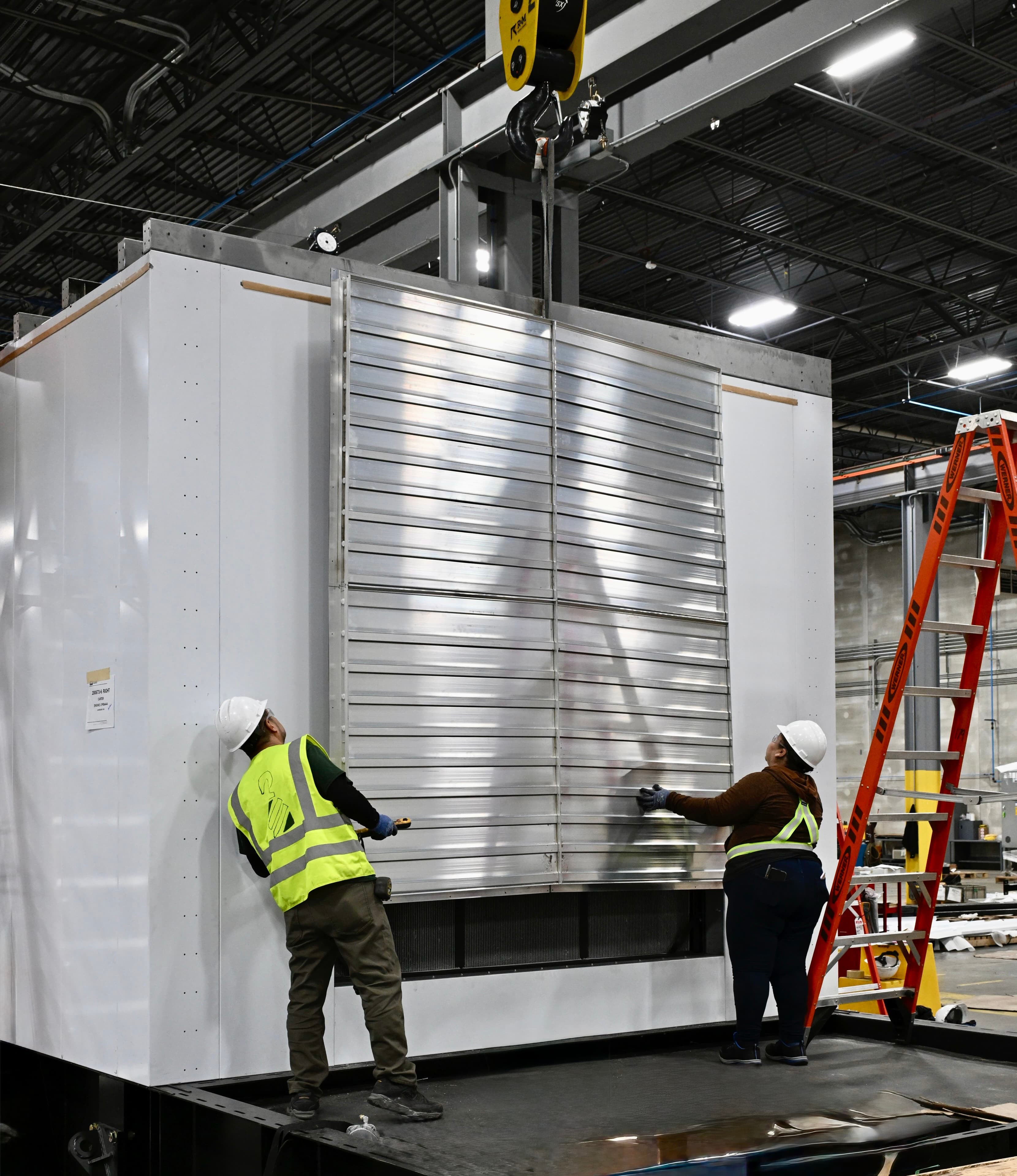 PSI manufacturing facility with enclosure being assembled